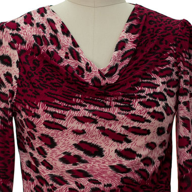 Gifts 4 All, Long sleeves cowl neck top featuring an animal print pattern. Self-tie waist sash. Brushed jersey knit. 
Available Colors: Teal or Burgundy
Fabric: brushed Jersey Knit
Content: 92% Polyester 8% Spandex