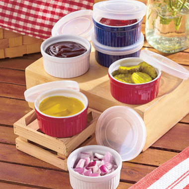 Gifts 4 All, You will receive 2 Ramekins and 2 Lids of your choice of color from Red, Green or Yellow.
Ramekin Set ensures you'll always have the right bowl for serving and storing. Each bowl has a clear, snap-tight lid, making them perfect for condiments, snacks, leftovers and more. You can even use the bowls to bake single-serve muffins, cornbread and cakes. Bowls, 3-1/4" dia. x 1-1/2"H. Hold 3 oz. Stoneware with plastic lids. Dishwasher, microwave and freezer safe. Bowls, oven safe.