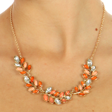 Gifts 4 All, 
This beautiful necklace set features leaf pattern in Blue or Orange and clear crystals in gold tone setting with gold tone chain. Comes with matching earrings. Great for any occasion. Simple yet elegant.