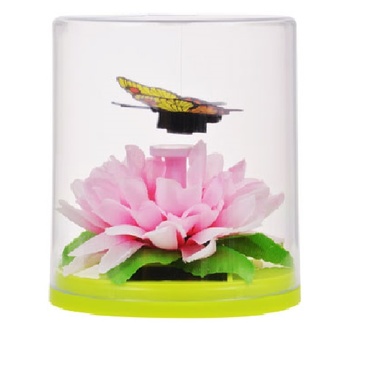 Gifts 4 All, Amaze your guests with these lovely spring-theme artificial terrarium! Plastic butterfly on thin wire flutter above an artificial tropical flower when their built-in solar-panel is in sunlight. The butterfly and flower live within plastic terrarium. An adorable accent in any room. 3¼" solar-powered fluttering tropical butterfly