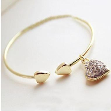 Gifts 4 All, Lovely gold or silver Color bracelet.
Description:
Heart Charm Size: Approx. 0.51 inch / 1.3 x 1.3cm
Inner Diameter: Approx. 2.2 inch / 5.6cm (adjustable)
Material: Alloy + rhinestone
Color: Gold or Silver 