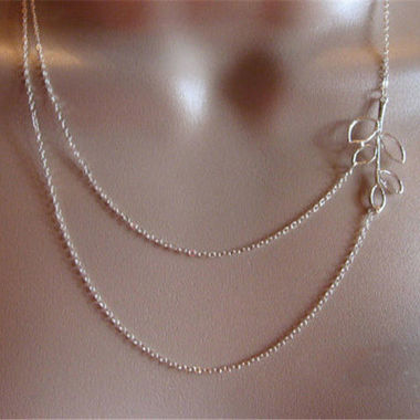 Gifts 4 All, This beautiful silver tone necklace features two chains attached to a leaf branch. Lobster clasp closure.
Great for everyday wear or for special occasions. 
Short Chain 18"