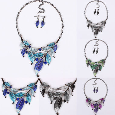 Gifts 4 All, Very beautiful necklace comes with Matching earrings. Enamel Leaves attached with jump rings and hematite chain. 2" extender
Available in Blue, Purple, Green or Black