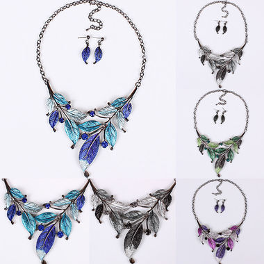 Gifts 4 All, Very beautiful necklace comes with Matching earrings. Enamel Leaves attached with jump rings and hematite chain. 2" extender
Available in Blue, Purple, Green or Black